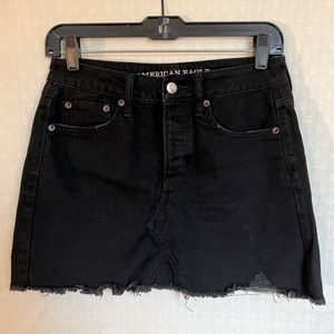 Black jean mini skirt